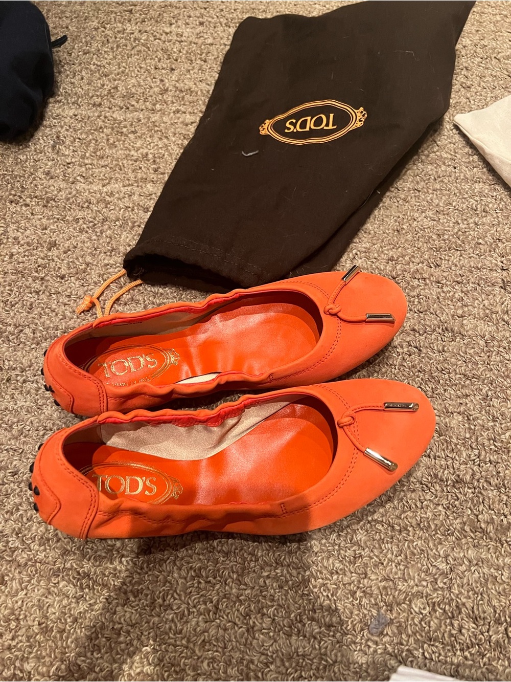 TOD’S orange suede flats
